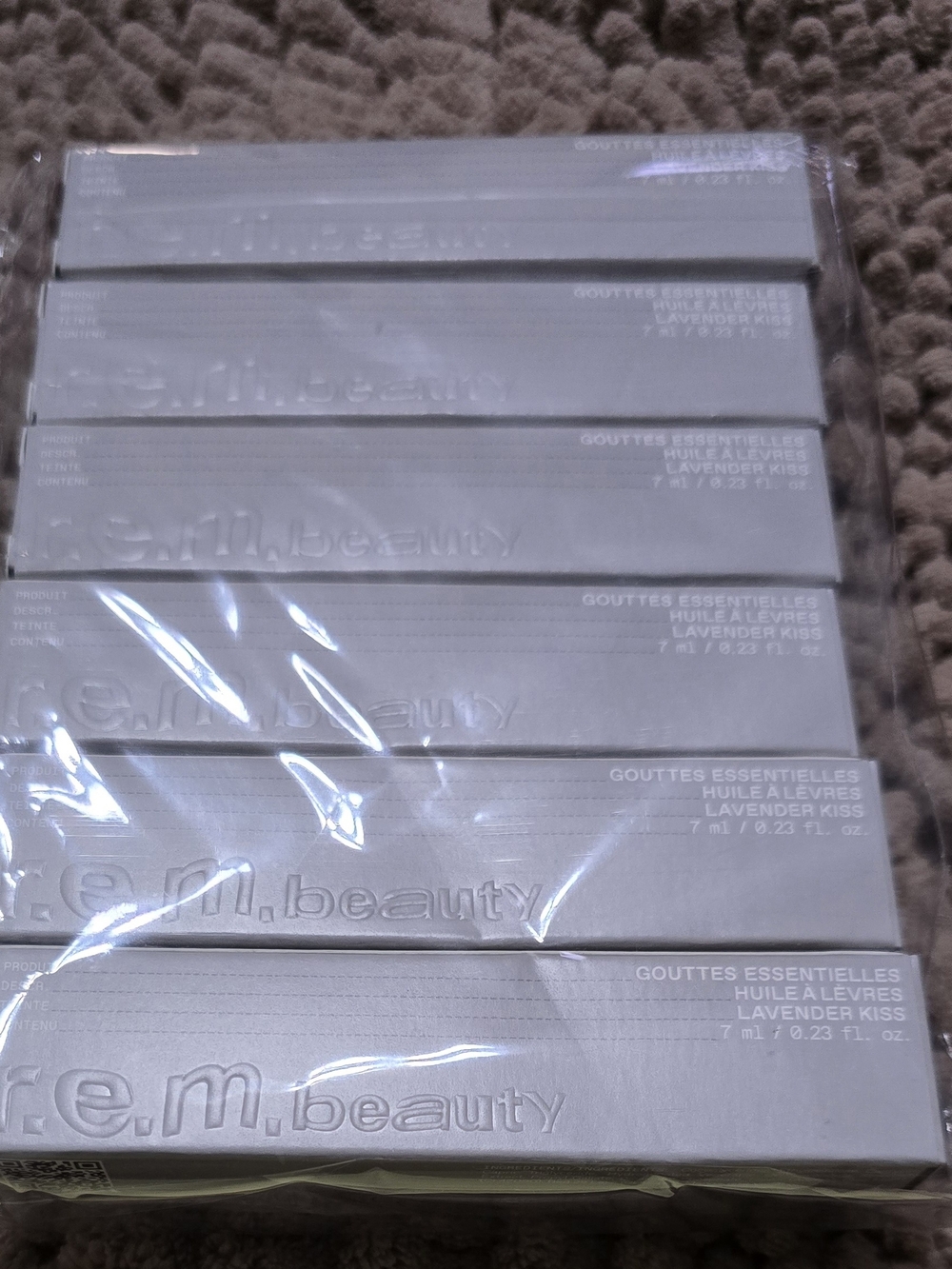 r.e.m.beauty Lavender Kiss Lip Oil - Soft Silver Packaging